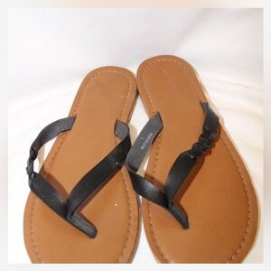 Simple black sandals.